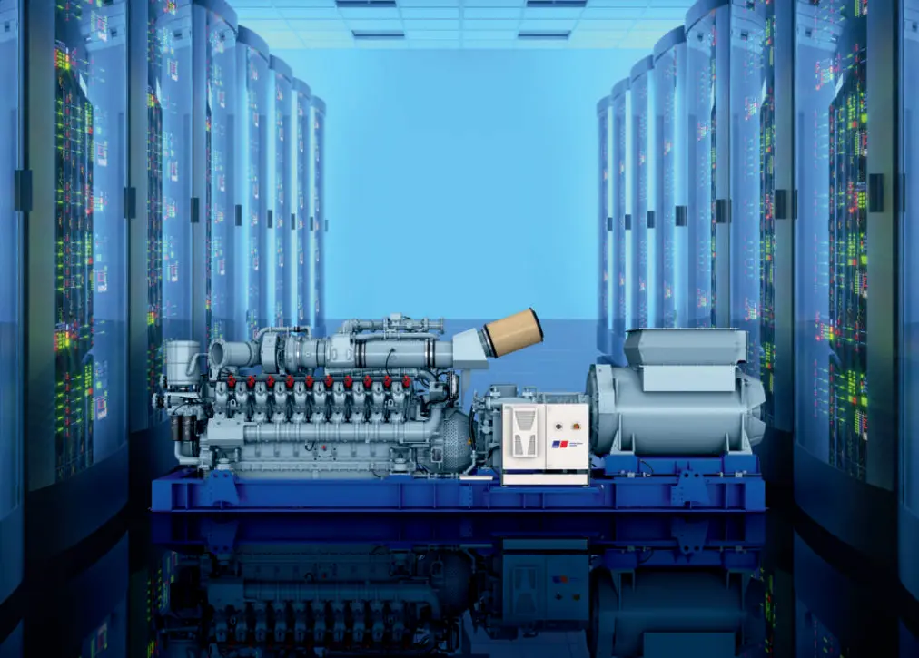 A large industrial generator set is positioned in the center of a modern data center, surrounded by rows of illuminated server racks on both sides.